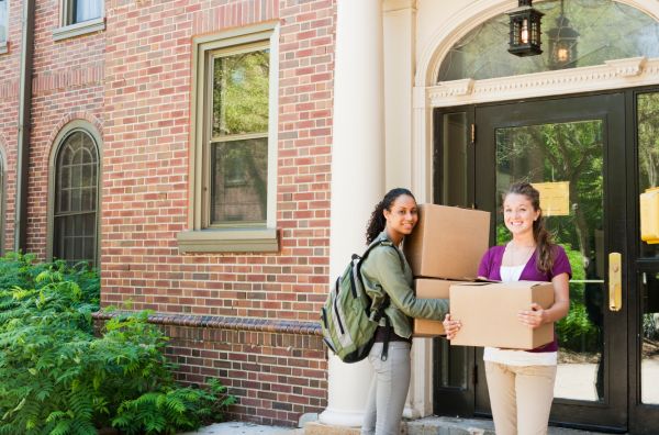Two college students ready to move into dorms